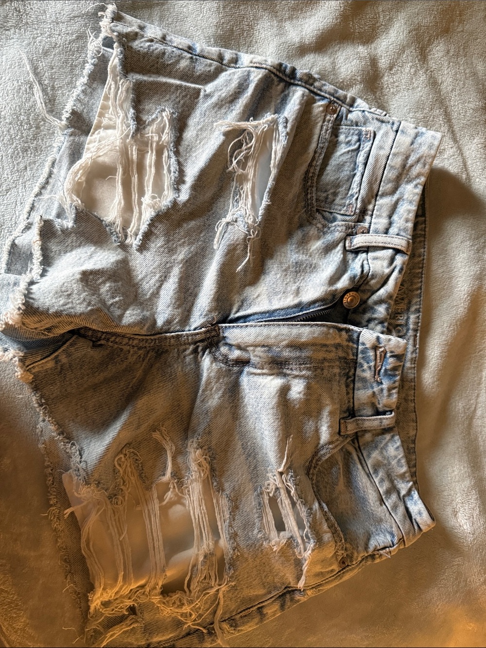 Distressed Light Wash Denim Shorts